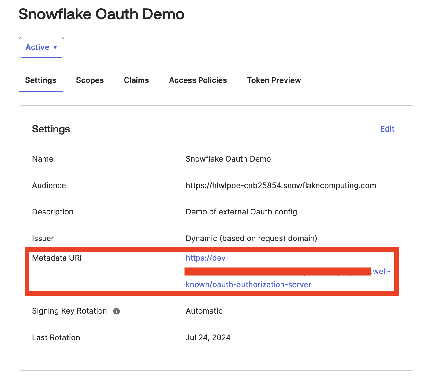 The Okta API settings page with the metadata URI highlighted.